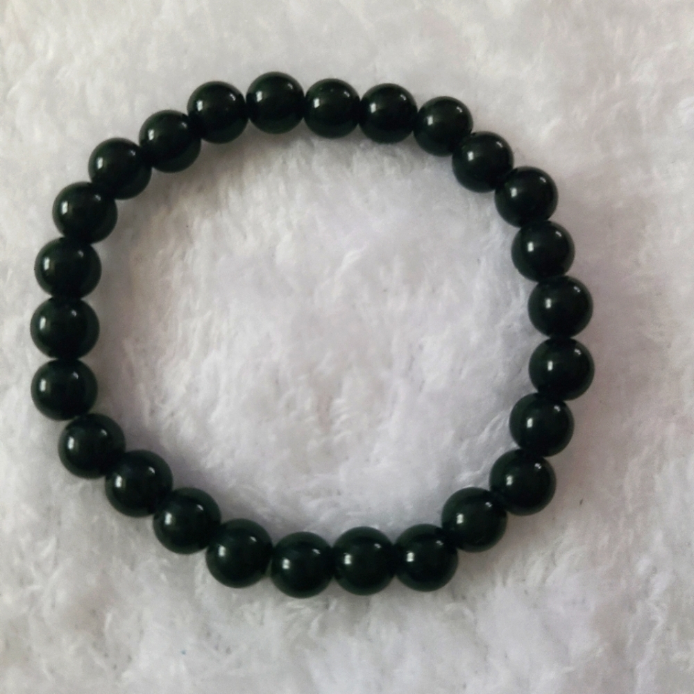 L & L black designer bracelet solid  spheres with stretch cord